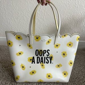 Kate Spade genuine leather Oops A Daisy shopping tote.